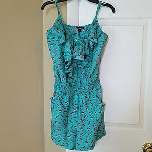 Like new, super cute romper, size Small